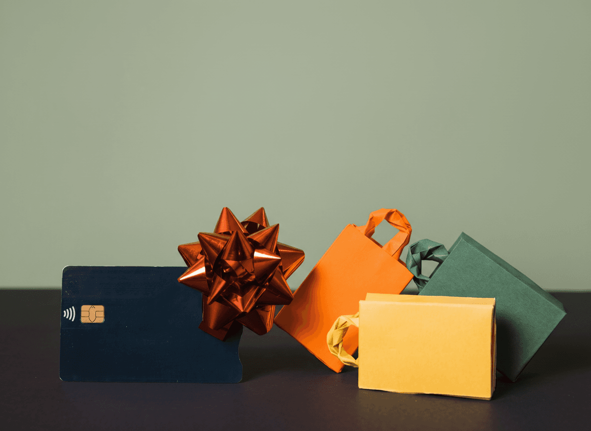 Fuel cards alongside wrapped gift boxes representing loyalty rewards